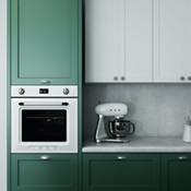 kitchen with green and white cabinets